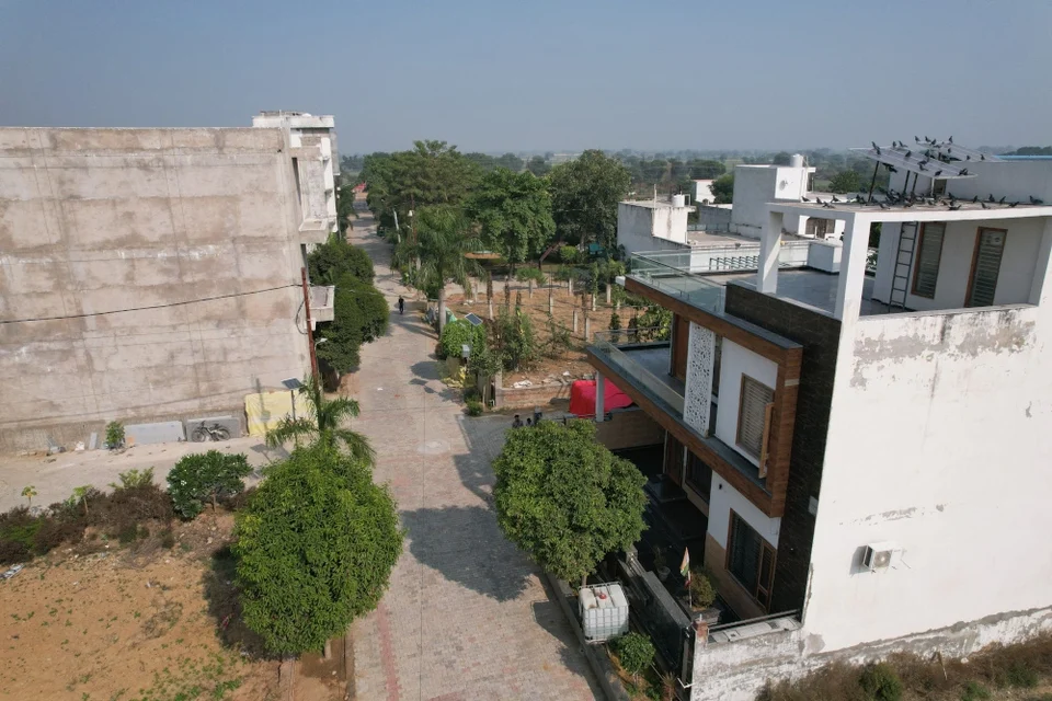 A street of built homes at Mahadev Vihar seen from above