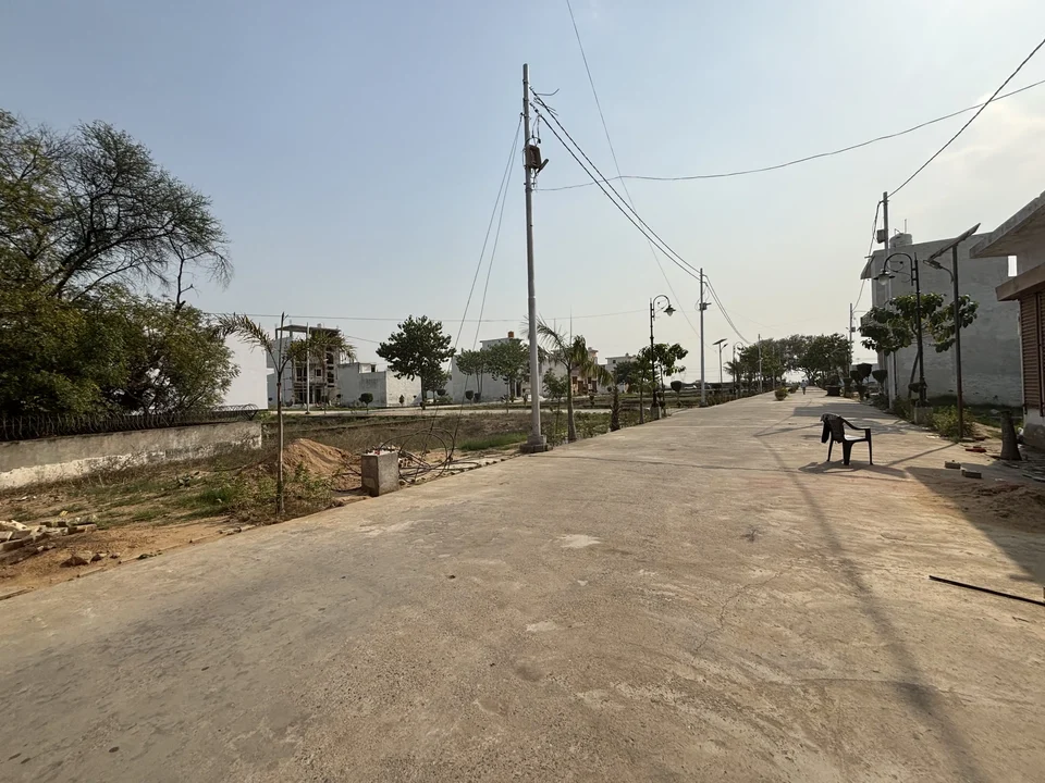An internal road with power lines at Shiv Shakti Vihar Phase 2